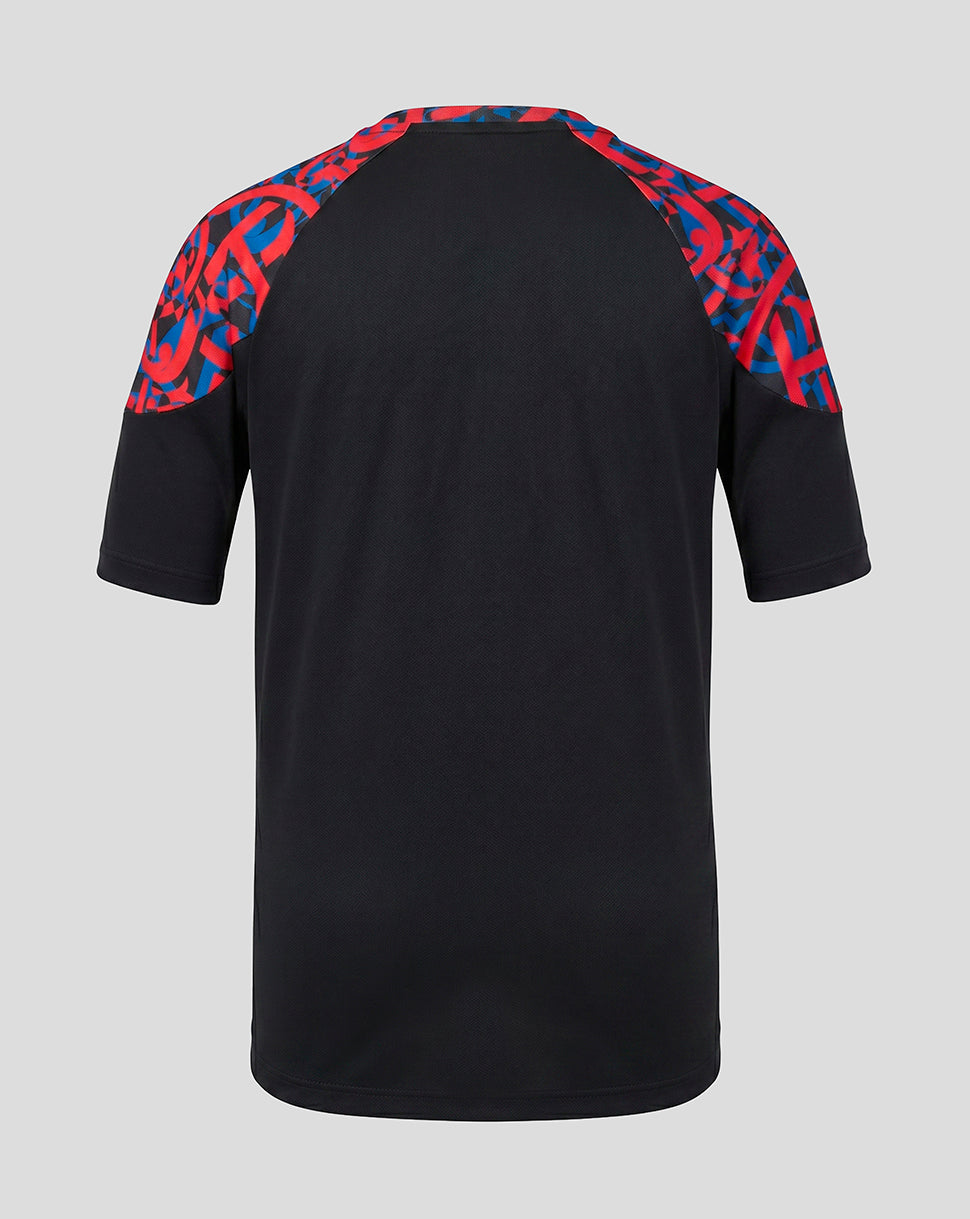 A black short-sleeve raglan t-shirt shown from the back, featuring a vibrant red and blue geometric pattern on the shoulders, set against a solid light gray background.