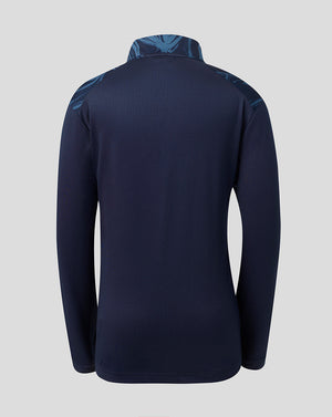 A dark navy blue long-sleeve athletic top shown from the back, featuring subtle tonal patterned detailing on the shoulders and collar, set against a solid light gray background.