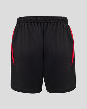 Side view of black FC Twente junior away shorts with red panels and a visible crest on the left leg.