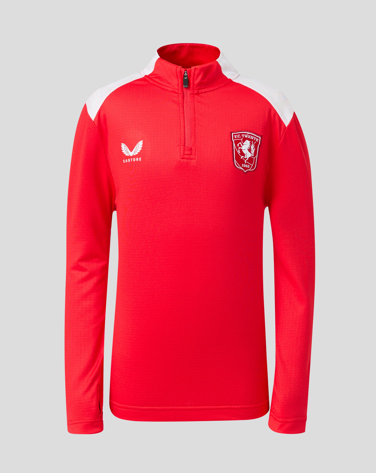 Front view of a red FC Twente Matchday intermedia layer with white shoulder panels and club crest on the chest