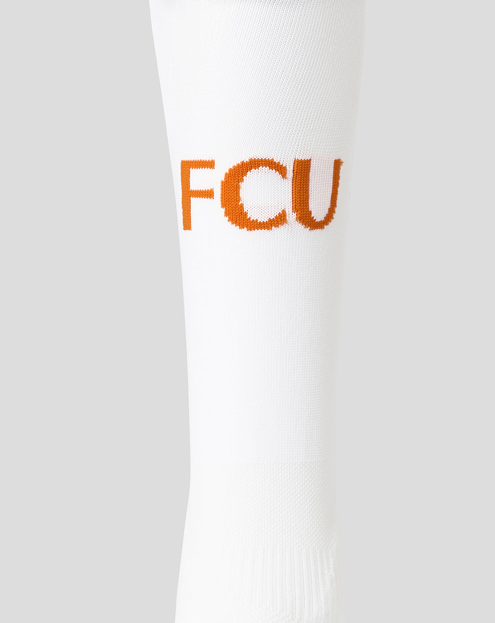 Close up of a white FC Utrecht junior third sock showing orange FCU lettering on the leg area.