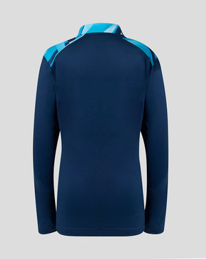 Rear view of Athletic Club junior navy long-sleeve midlayer with light blue shoulder panels.