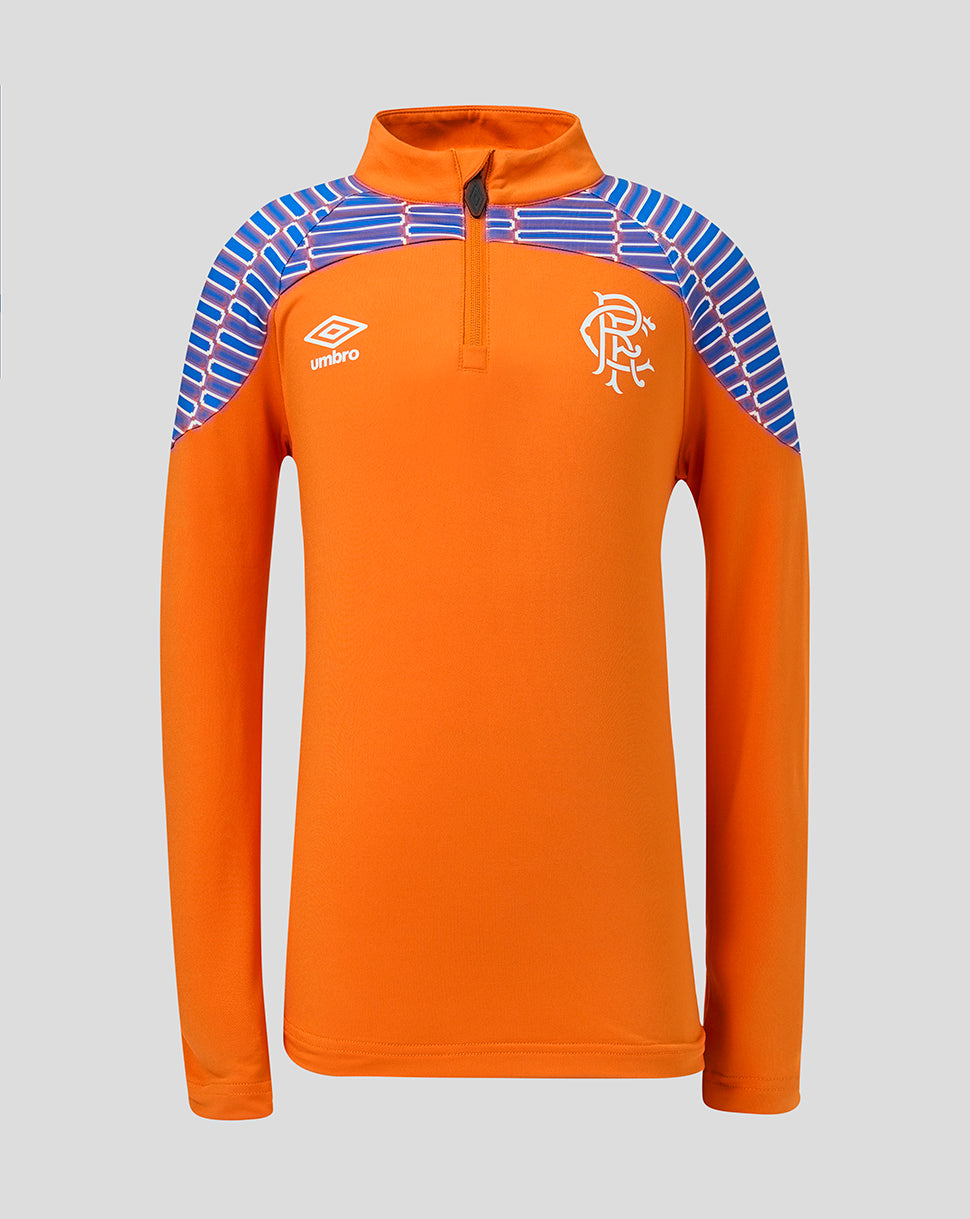 An orange long-sleeve quarter-zip athletic top with blue and white striped shoulder panels, featuring the Umbro logo on the right chest and the Rangers FC crest on the left chest, shown against a solid gray background.