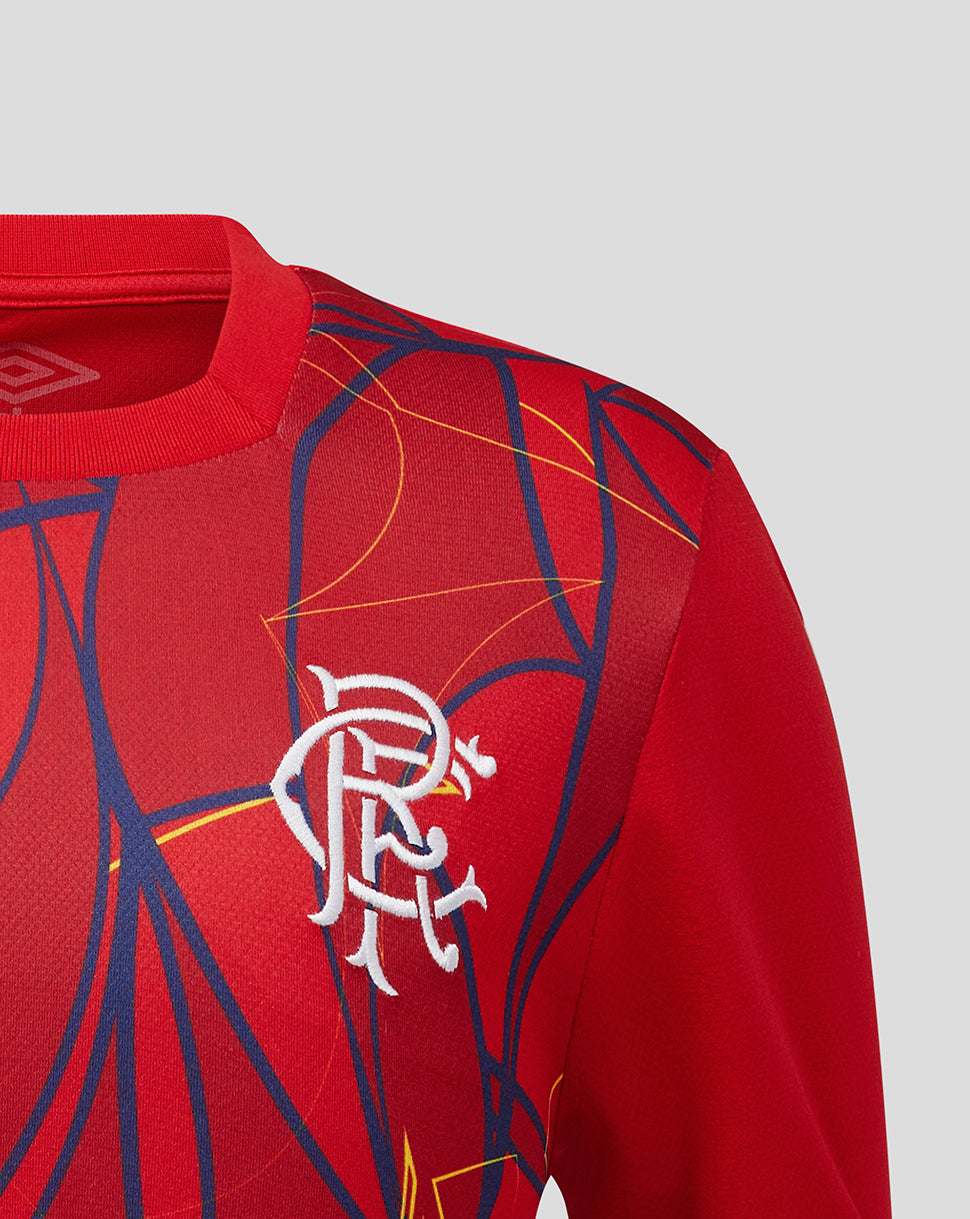 Red sports jersey with blue and yellow abstract design and white logo on a light gray background