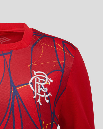 Red sports jersey with blue and yellow abstract design and white logo on a light gray background