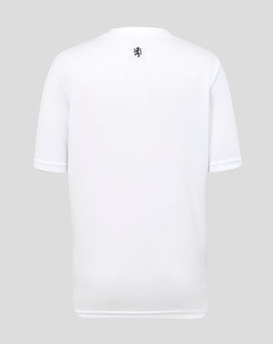 White t-shirt with a small logo on the chest against a light gray background