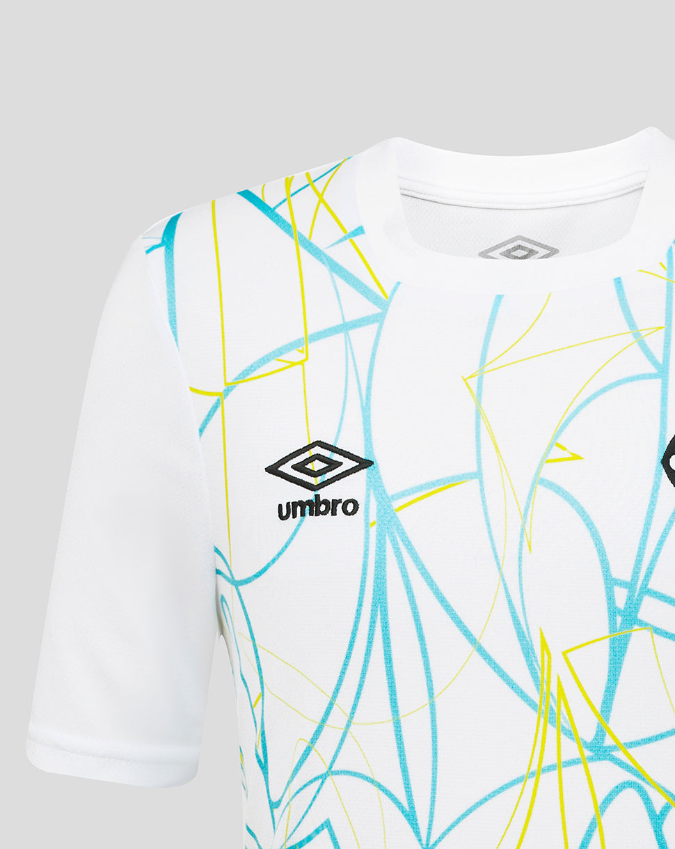 White t-shirt with blue and yellow abstract patterns and Umbro logo on a gray background