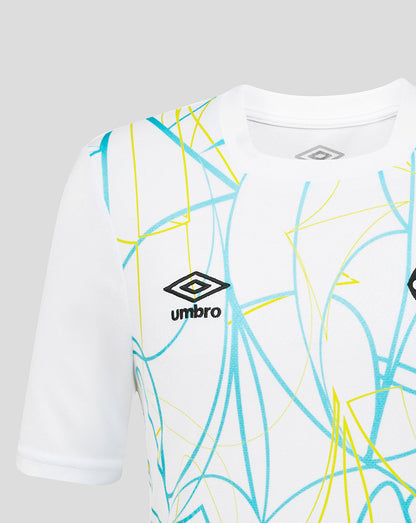White t-shirt with blue and yellow abstract patterns and Umbro logo on a gray background