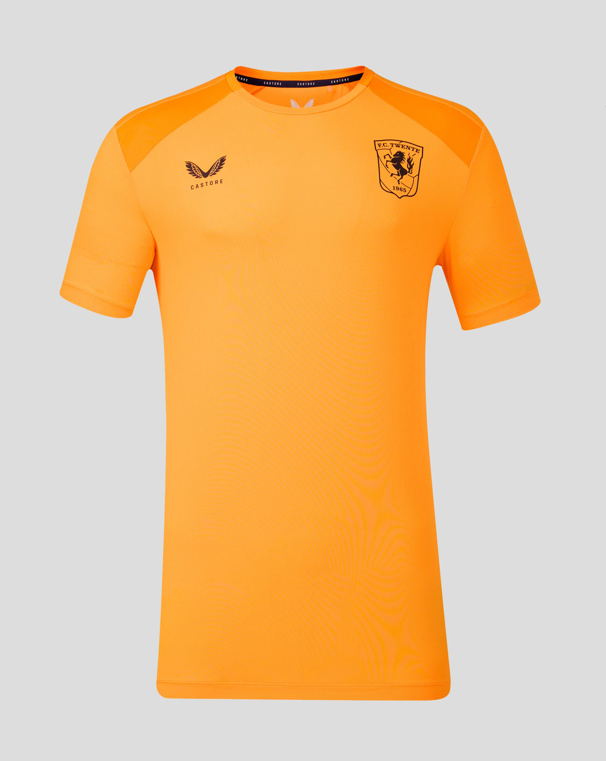 Bright orange FC Twente training shirt for men with Castore branding and the FC Twente crest on the chest.