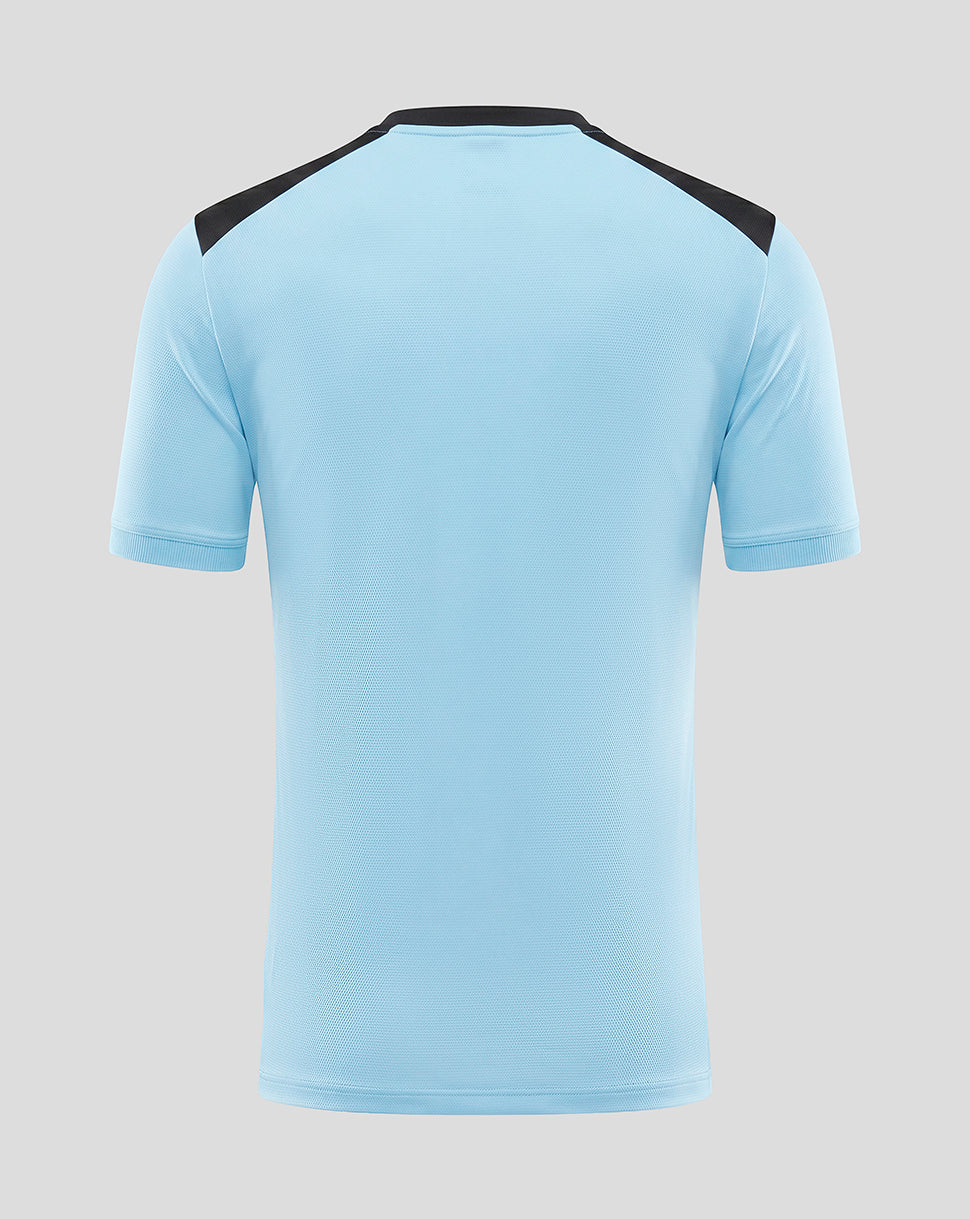 Back view of a light blue Feyenoord training shirt with black shoulder panels