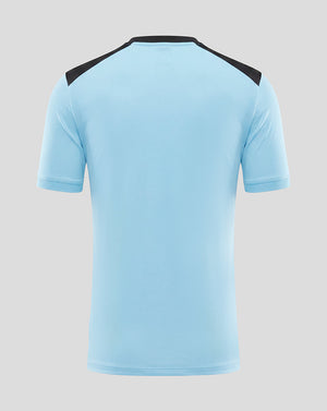 Back view of a light blue Feyenoord training shirt with black shoulder panels