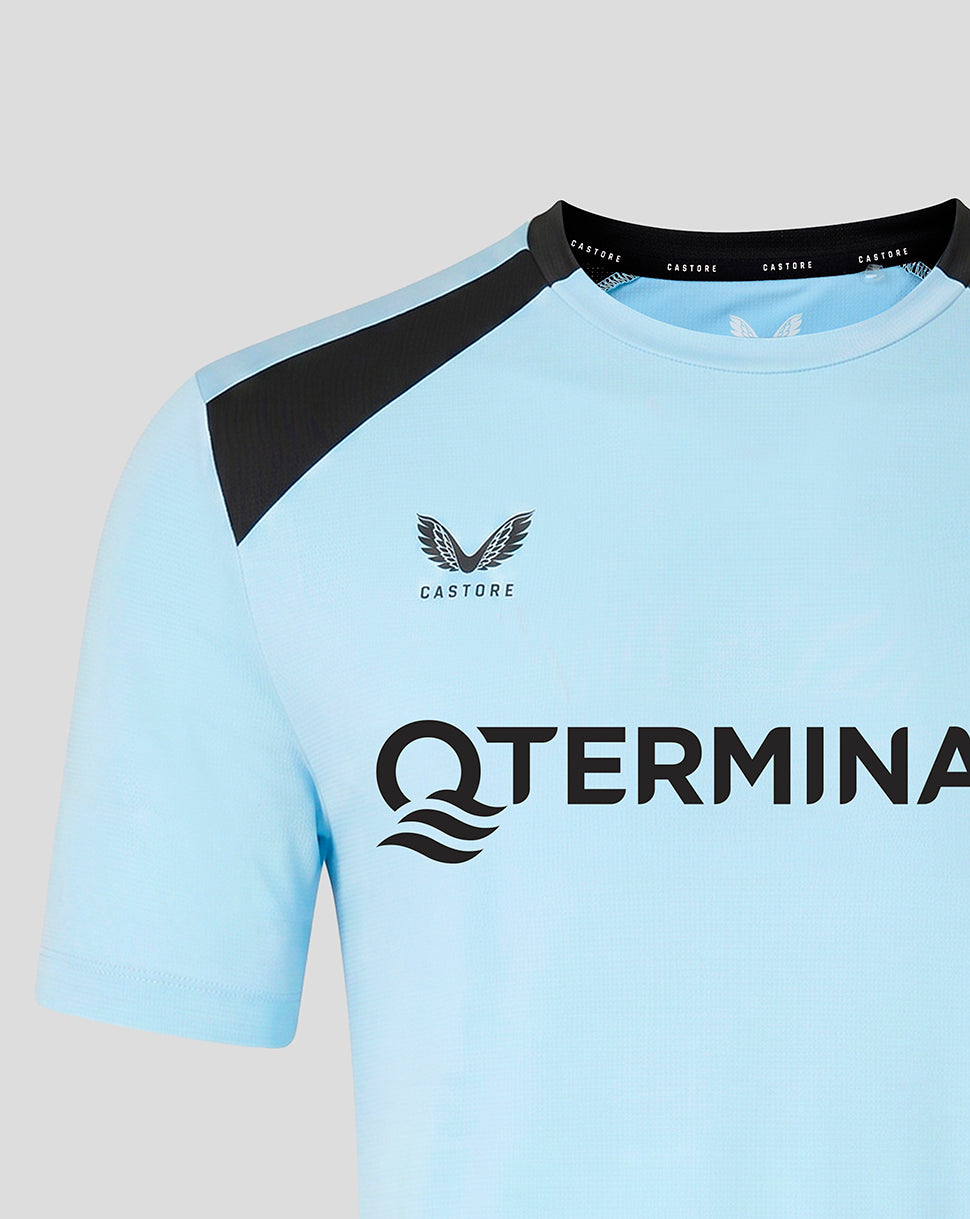 Front close up of light blue Feyenoord training shirt with crest on the chest and black diagonal shoulder panel