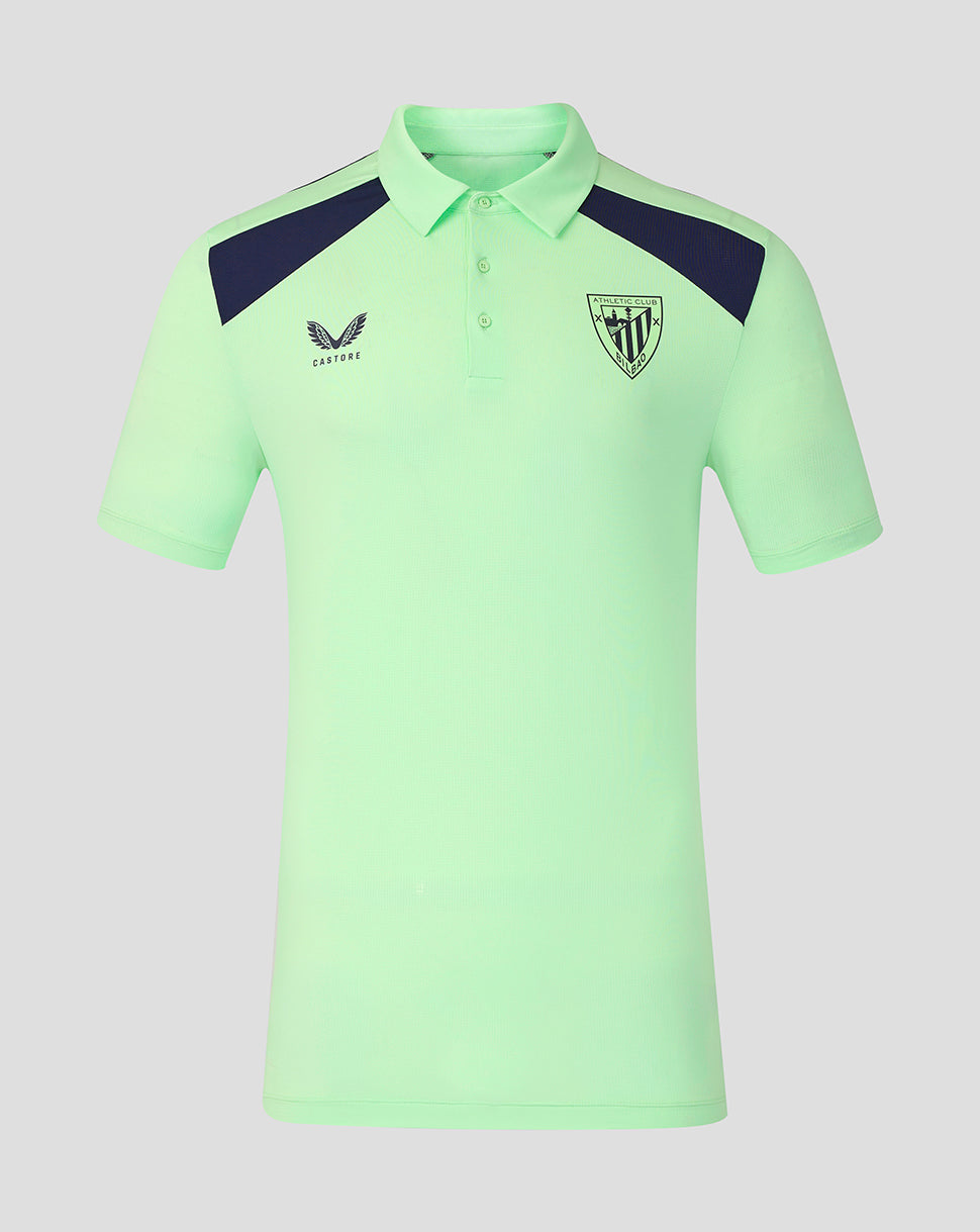 Front view of mint green Athletic Club training polo shirt with navy shoulder panels and crest badge