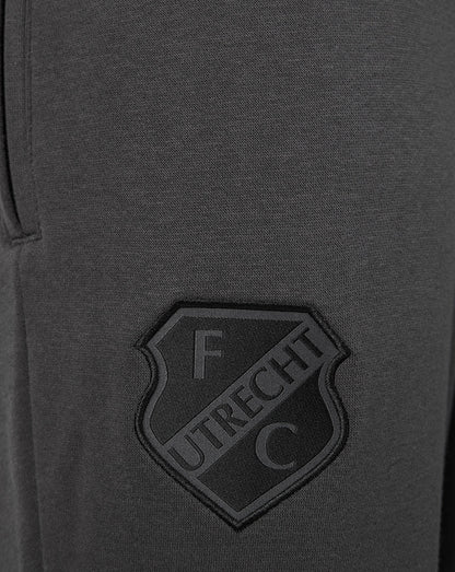 Dark grey FC Utrecht travel fleece shorts fabric with a raised shield crest patch.