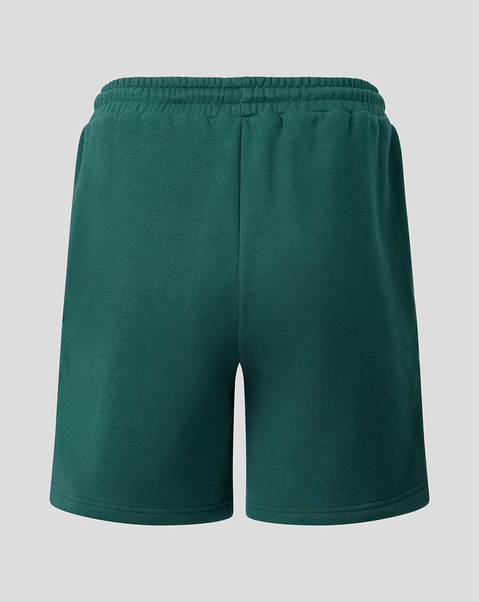 Back view of green Feyenoord travel fleece shorts with an elastic waistband and left leg crest.
