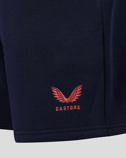 Navy shorts with red Castore logo on a light gray background
