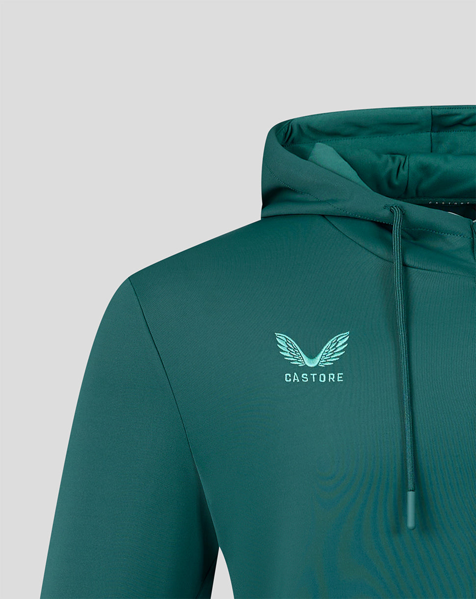 Chest area of green Feyenoord travel hoodie showing the Castore logo with wings.