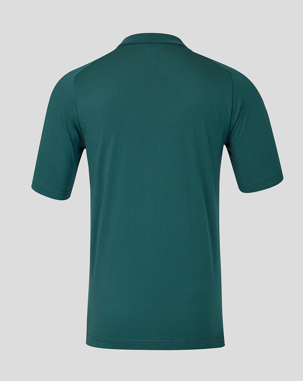 Back view of teal polo shirt with short sleeves and classic polo collar.