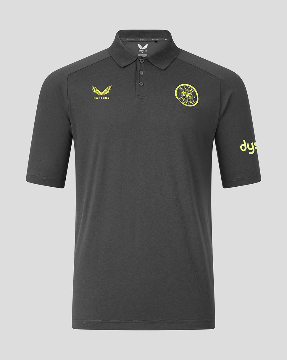 Front view of a dark grey Bath Rugby Travel Polo with a yellow Bath Rugby crest on the left chest