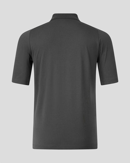 A dark gray short-sleeve polo shirt shown from the back, displayed on a clean light gray background.