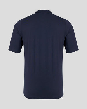 Back view of a navy FC Twente men's travel polo shirt with short sleeves.
