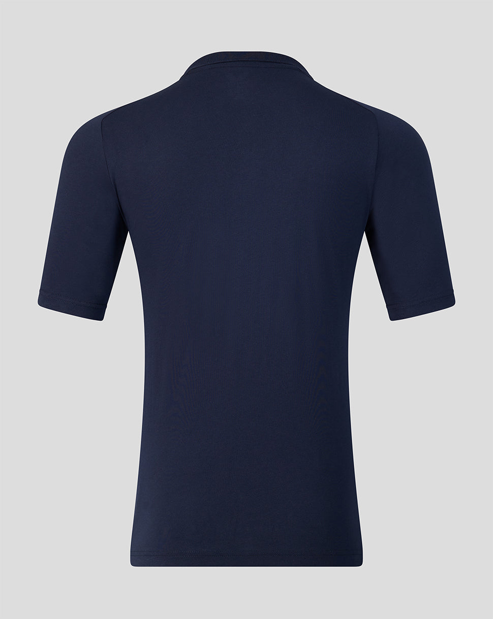 Navy blue polo shirt on a light gray background
