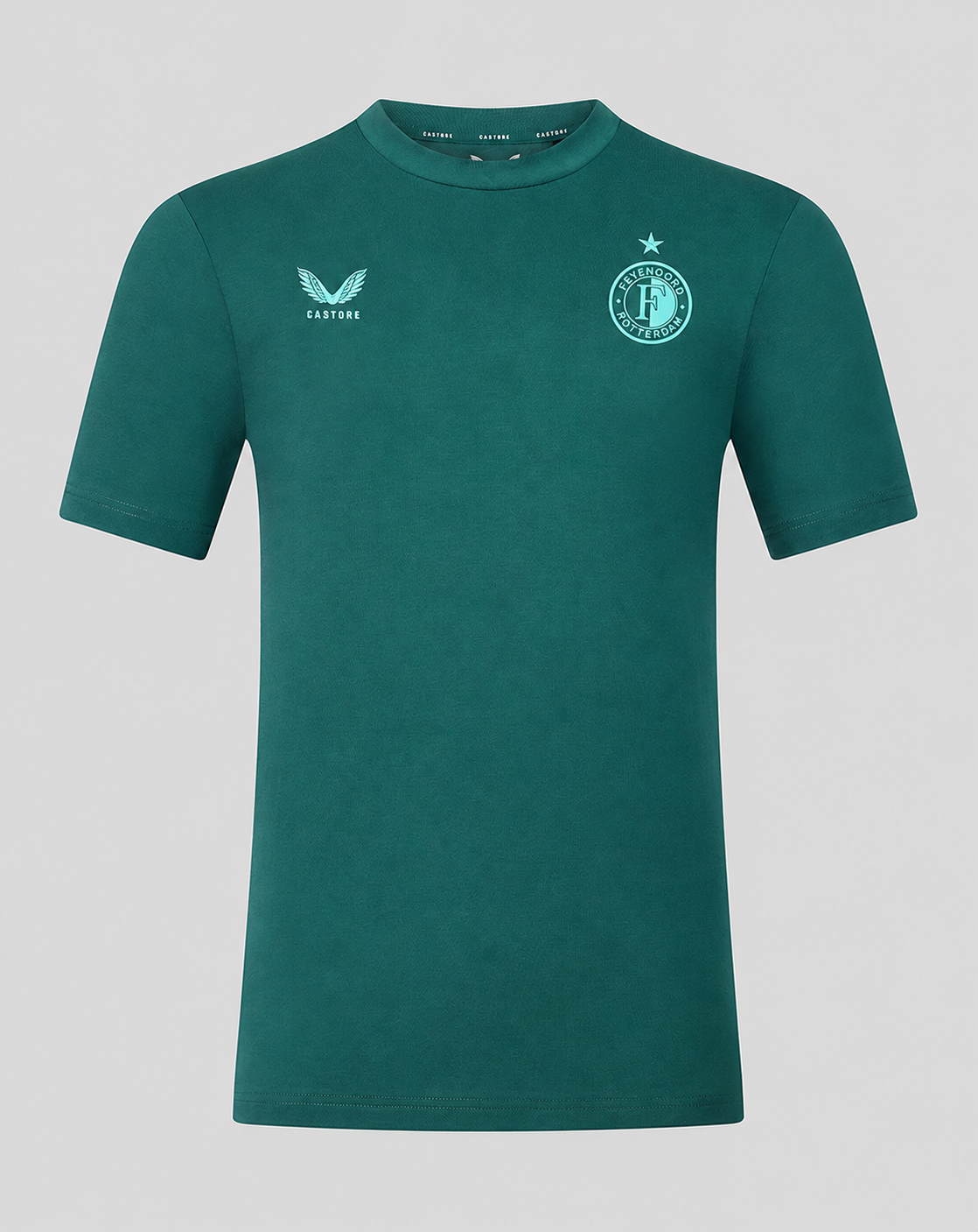 Front view of Feyenoord travel shirt in green with club crest on the left chest and Castore logo on the right.