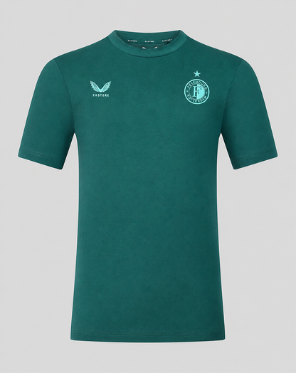 Front view of Feyenoord travel shirt in green with club crest on the left chest and Castore logo on the right.