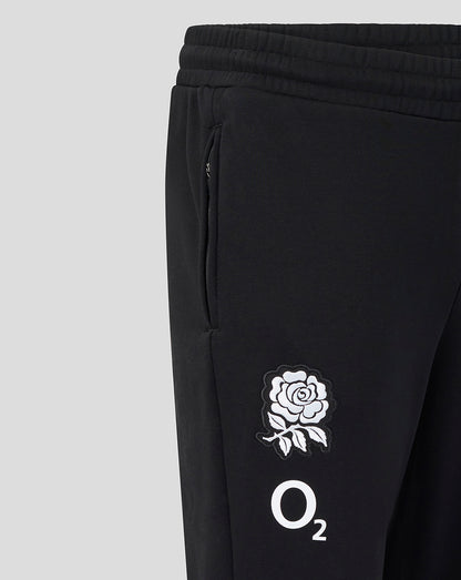 Black pants with a white logo on a light gray background