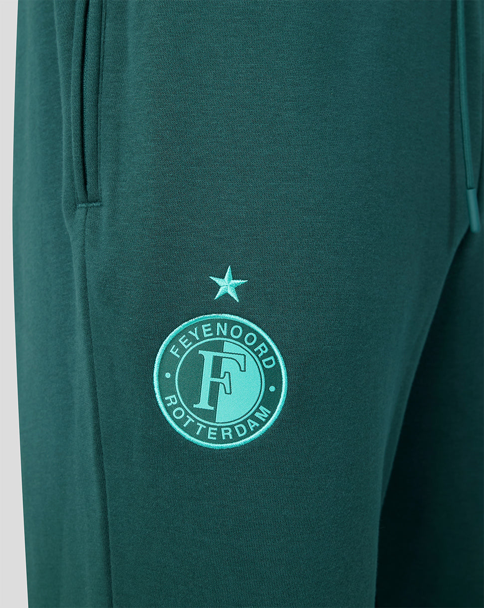 Close-up of the joggers pocket area with Feyenoord crest embroidery.