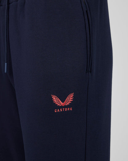 Navy blue pants with a red embroidered logo on a light gray background