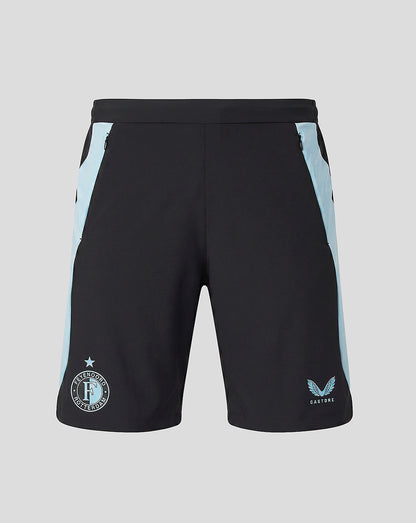 Front view of black training shorts with light blue side panels and pockets, Feyenoord crest on left leg and Castore emblem on right.