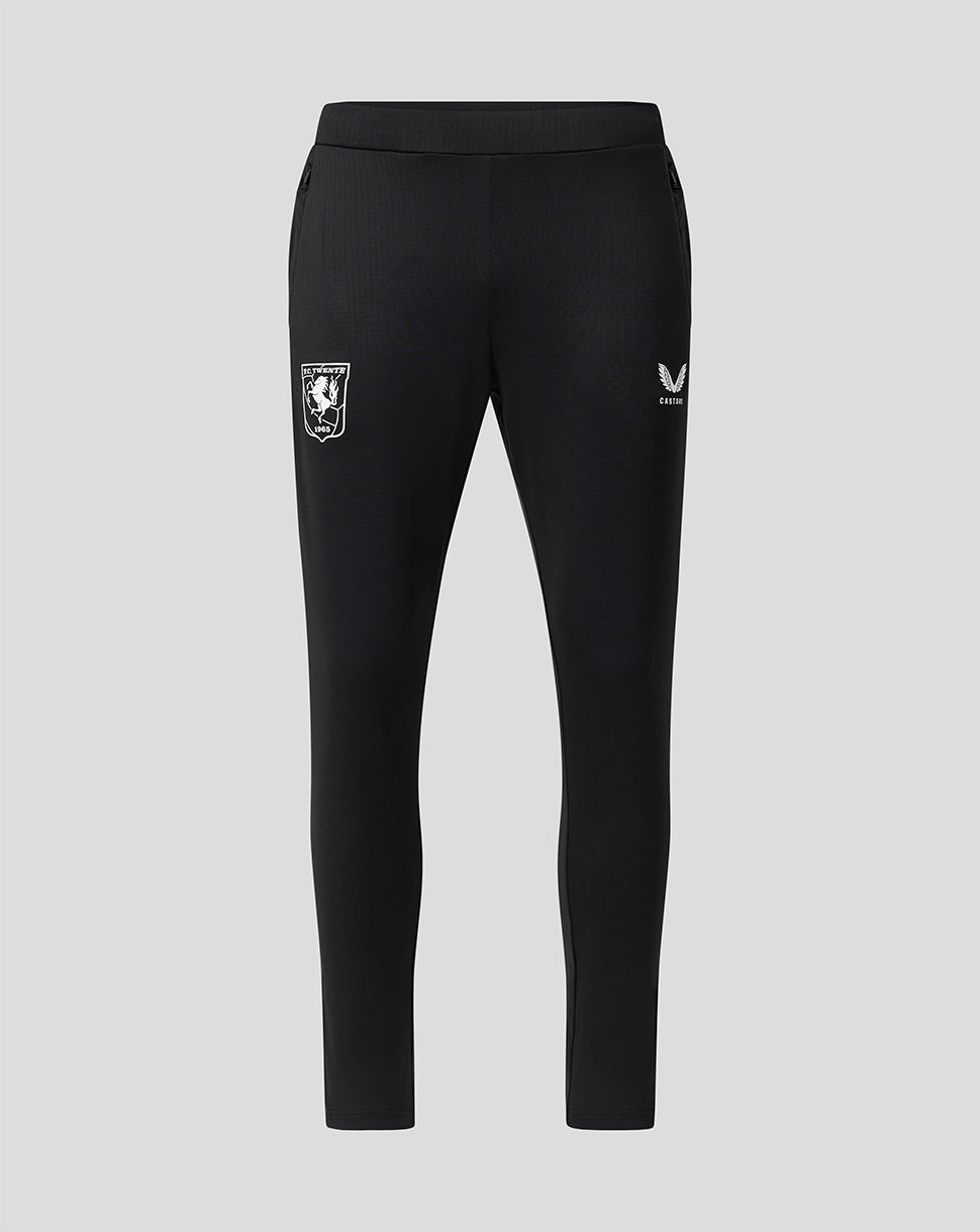 Front view of black FC Twente 26/27 training pants with side pockets, crest on left leg and Castore logo on right leg