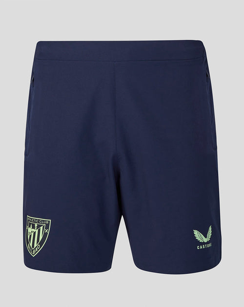 Back view of navy Athletic Club training shorts with a light green crest on the left leg and mint logo on the right