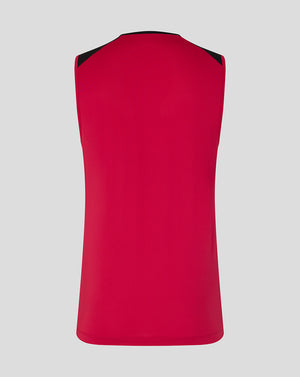 Red sleeveless top with black trim on a light gray background