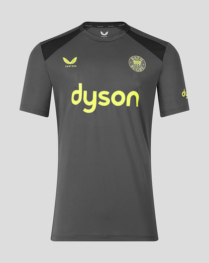 A dark gray short-sleeve soccer jersey with black shoulder panels, featuring a yellow 'dyson' sponsor logo across the chest, a yellow 'CASTORE' logo on the right chest, and a circular 'BATH RUGBY' crest on the left chest, shown against a light gray background.