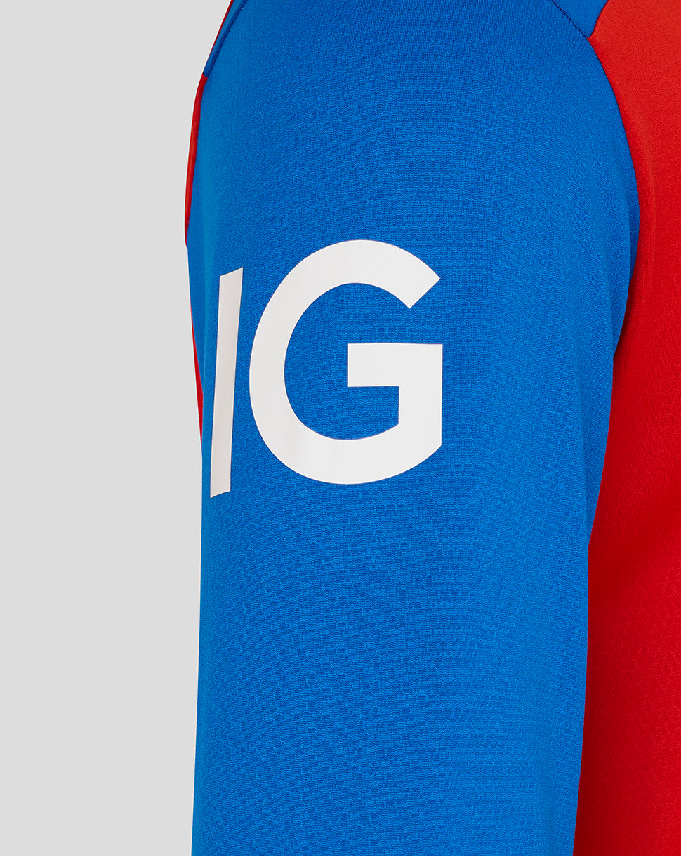 Blue and red sleeveless top with a large white 'IG' logo on a gray background