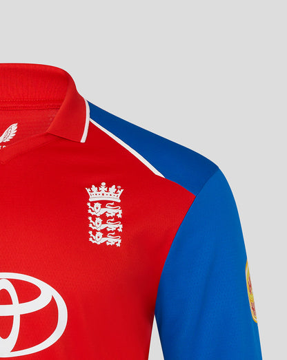 Red and blue sports jersey with a logo on a gray background