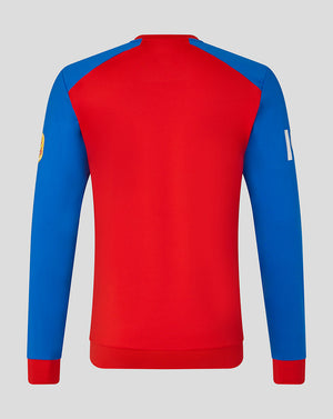 Red and blue long-sleeve shirt on a gray background