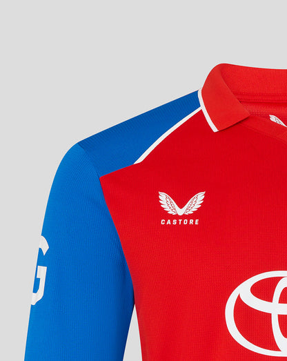 Red and blue sports jersey with Castore and Toyota logos on a gray background