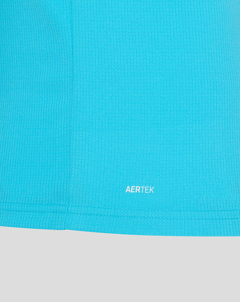 Close-up of a blue fabric with 'AERTEK' branding, transitioning to gray at the bottom.
