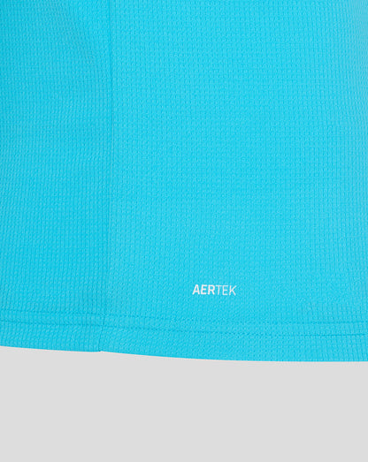 Close-up of a blue fabric with 'AERTEK' branding, transitioning to gray at the bottom.