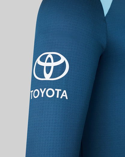 Blue top with Toyota logo on a gray background