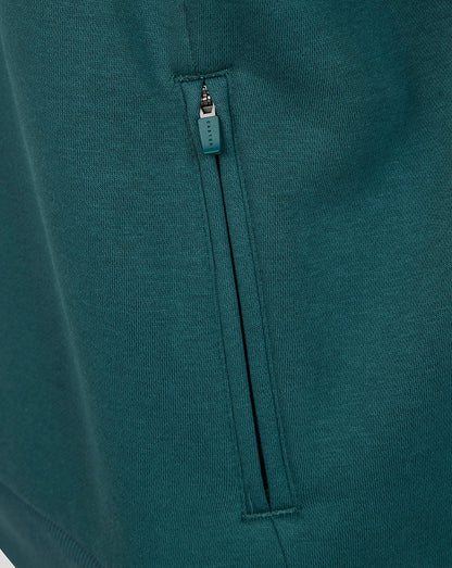 Teal green zip pocket on Athletic Club Men's Travel Hooded Sweatshirt with Castore zipper pull.