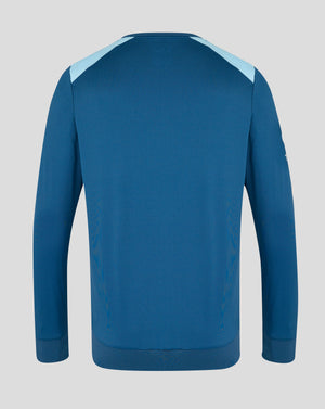 Blue long-sleeve shirt with light blue accents on a gray background
