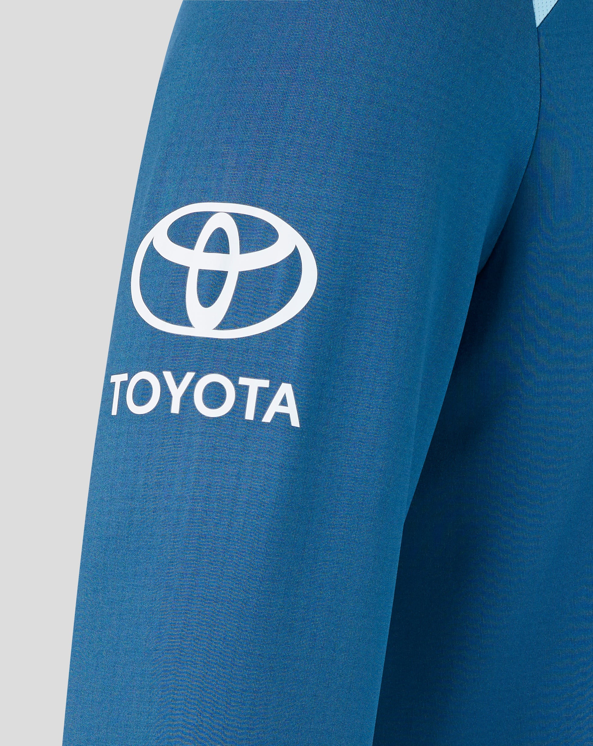 Blue sleeve with Toyota logo on a gray background