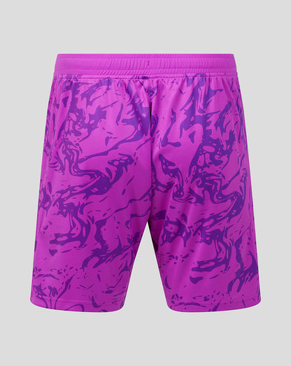 Purple patterned shorts on a gray background