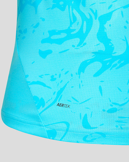 Close-up of a blue athletic top with abstract pattern and 'AERTEK' branding.