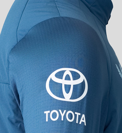 Blue jacket with Toyota logo on the back against a light gray background