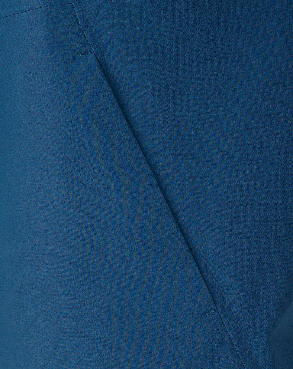 Close-up of blue fabric with a visible seam